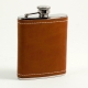 6 oz. Stainless Steel Flask in Saddle Leather and White Stitch Accents.
